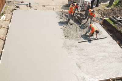 Contractor Working on Concrete Slab